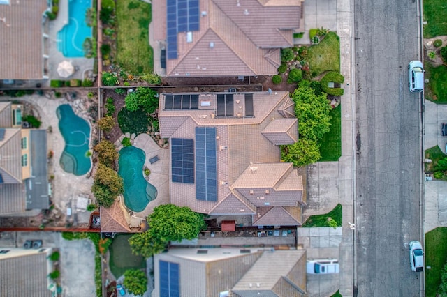 aerial overview of property's location with a pool area and property parcel outlined