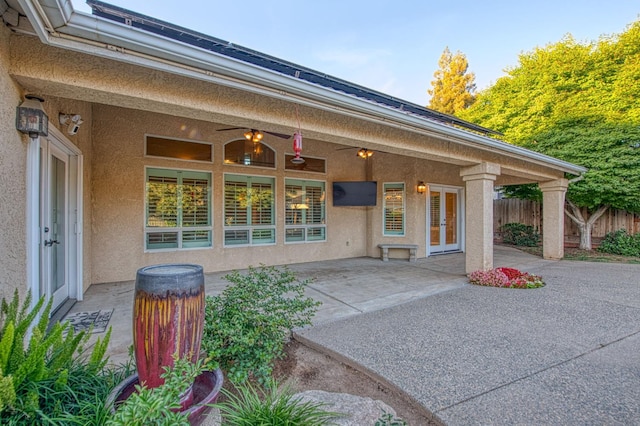 view of patio / terrace with fence and french doors
