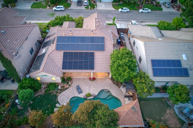 view of subject property featuring a pool