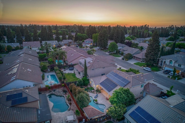 aerial view of residential area with a pool area