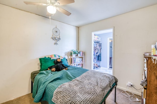 bedroom with carpet flooring, ceiling fan, and baseboards