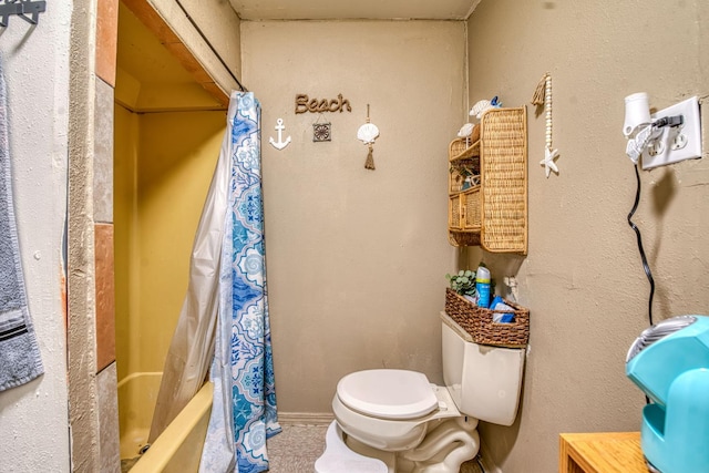 bathroom with toilet and shower / bath combination with curtain