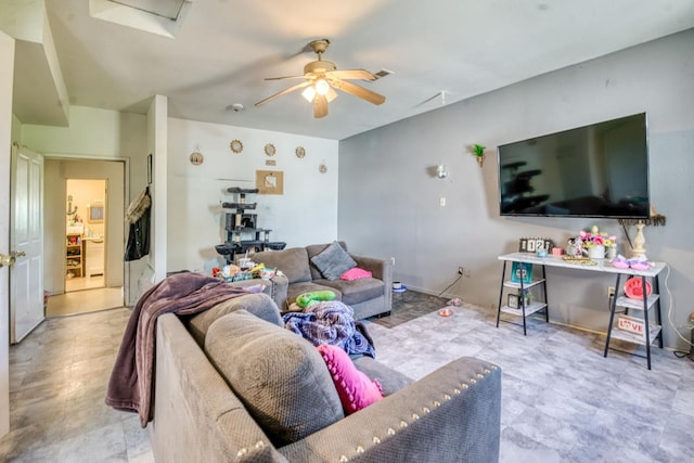living room featuring a ceiling fan