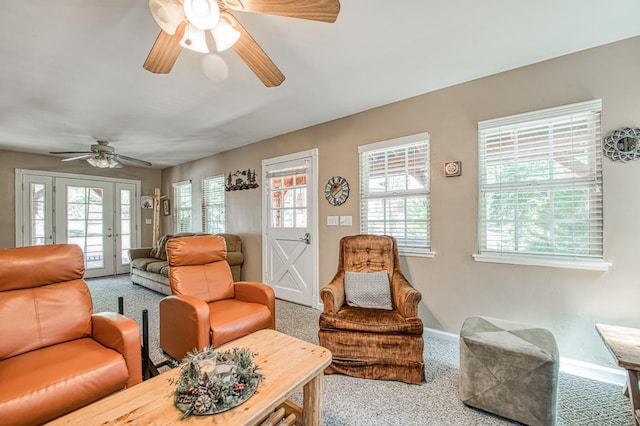 41533 Indian Rock Rd, Shaver Lake, CA 93664 - carpeted living area featuring healthy amount of natural light, a ceiling fan, baseboards, and french doors