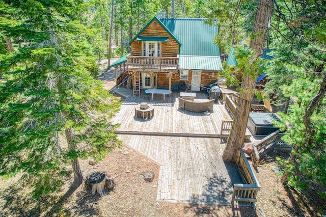 41533 Indian Rock Rd, Shaver Lake, CA 93664 - rear view of house with a deck, stairway, french doors, and metal roof