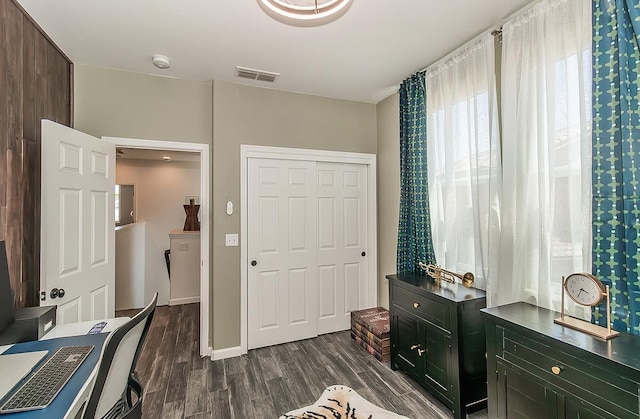 7005 N Astoria Ave, Fresno, CA 93722 - office with dark wood-style floors and baseboards