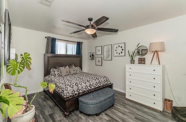 7005 N Astoria Ave, Fresno, CA 93722 - bedroom with wood finished floors, baseboards, and a ceiling fan