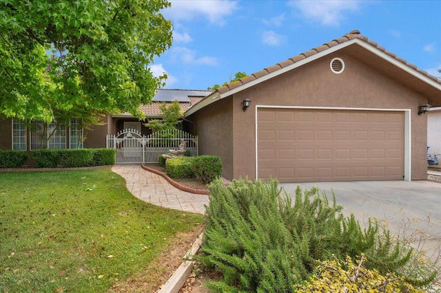 6380 N Cleo, Fresno, CA 93722 - ranch-style home with stucco siding, roof mounted solar panels, a tile roof, a garage, and concrete driveway