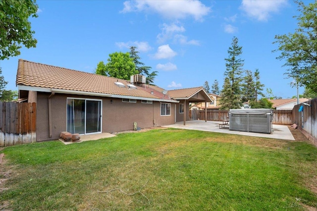 6380 N Cleo, Fresno, CA 93722 - back of house featuring a tile roof, a patio, stucco siding, and cooling unit
