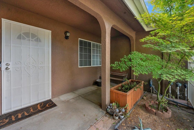 6380 N Cleo, Fresno, CA 93722 - view of exterior entry featuring stucco siding