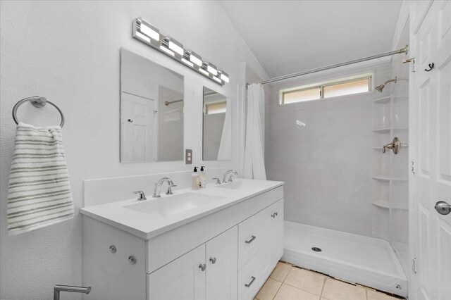 6380 N Cleo, Fresno, CA 93722 - bathroom featuring a shower with curtain, tile patterned flooring, and double vanity