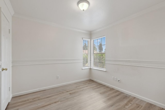 7307 N Lola Ave, Fresno, CA 93722 - unfurnished room featuring ornamental molding, wood finished floors, and baseboards