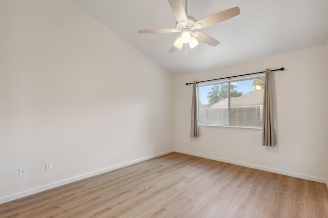 7307 N Lola Ave, Fresno, CA 93722 - spare room featuring light wood-type flooring, a ceiling fan, lofted ceiling, and baseboards