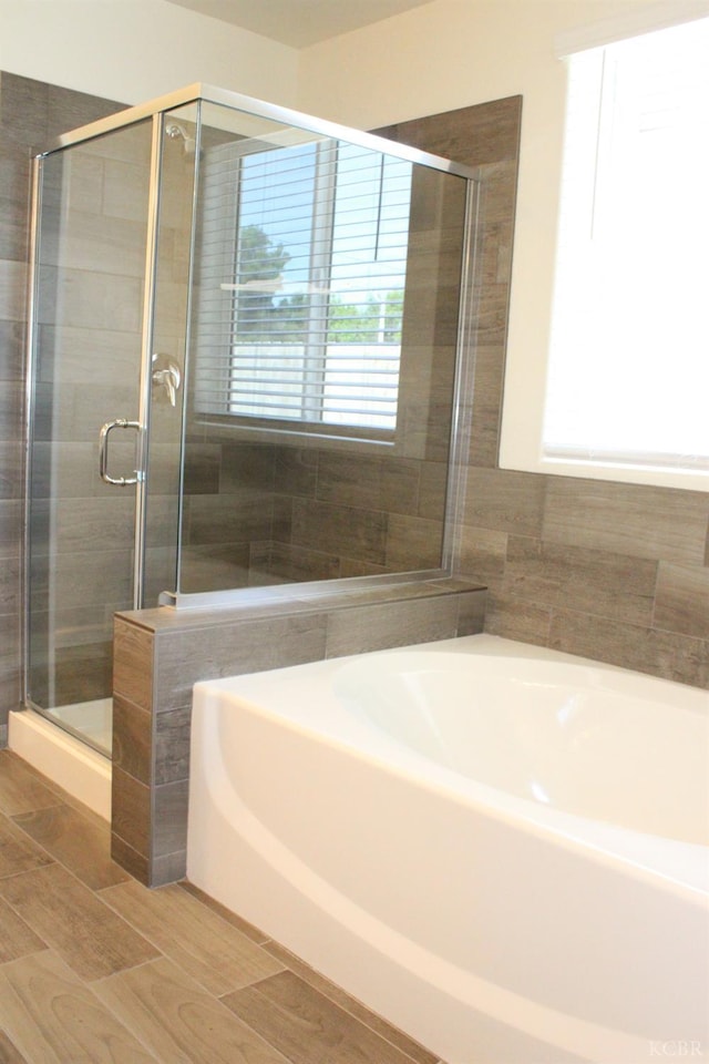2158 W Ambassador Way, Hanford, CA 93230 - bathroom featuring a stall shower and a bath