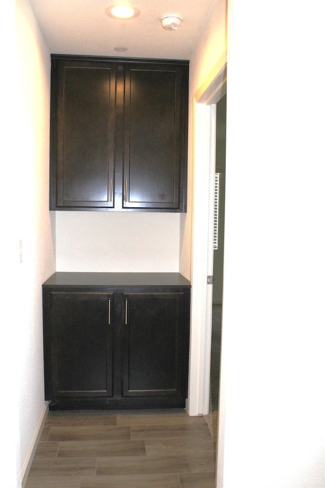 2158 W Ambassador Way, Hanford, CA 93230 - detailed view of wood finished floors and a smoke detector