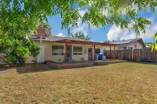 3512 E Simpson Ave, Fresno, CA 93703 - rear view of property featuring a chimney, a patio area, and stucco siding