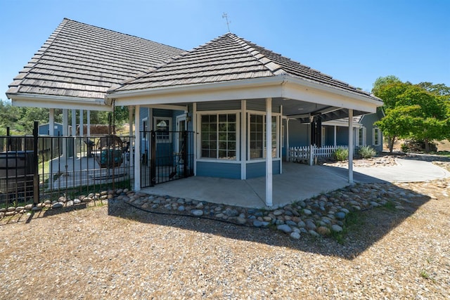 43480 Cave Stone Ct, Coarsegold, CA 93614 - rear view of property featuring a patio and fence