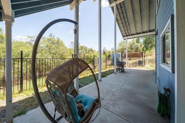 43480 Cave Stone Ct, Coarsegold, CA 93614 - view of patio featuring a storage shed, a fenced backyard, an outbuilding, and grilling area
