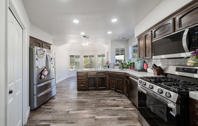 43480 Cave Stone Ct, Coarsegold, CA 93614 - kitchen featuring stainless steel appliances, dark brown cabinetry, recessed lighting, dark wood-style flooring, and a ceiling fan