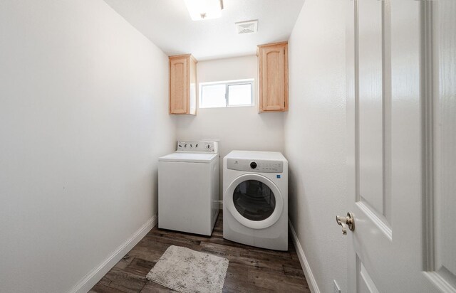 43480 Cave Stone Ct, Coarsegold, CA 93614 - washroom with cabinet space, separate washer and dryer, dark wood-style floors, and baseboards