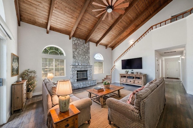 43480 Cave Stone Ct, Coarsegold, CA 93614 - living room with high vaulted ceiling, a ceiling fan, wooden ceiling, hardwood / wood-style floors, and a fireplace