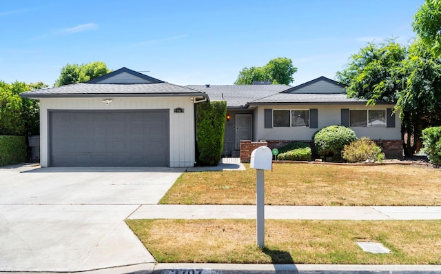 2707 W Acacia Ave, Fresno, CA 93705 - ranch-style home with a garage, concrete driveway, a front yard, and a shingled roof