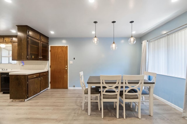2707 W Acacia Ave, Fresno, CA 93705 - dining area featuring light wood-style flooring, baseboards, and recessed lighting
