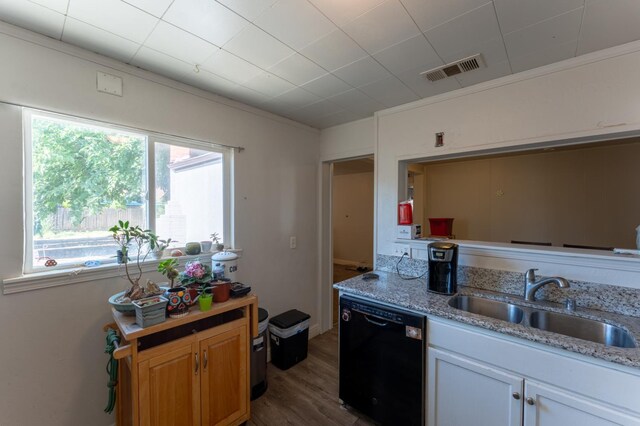 1428 E Simpson, Fresno, CA 93704 - kitchen featuring black dishwasher, a sink, wood finished floors, light stone countertops, and ornamental molding
