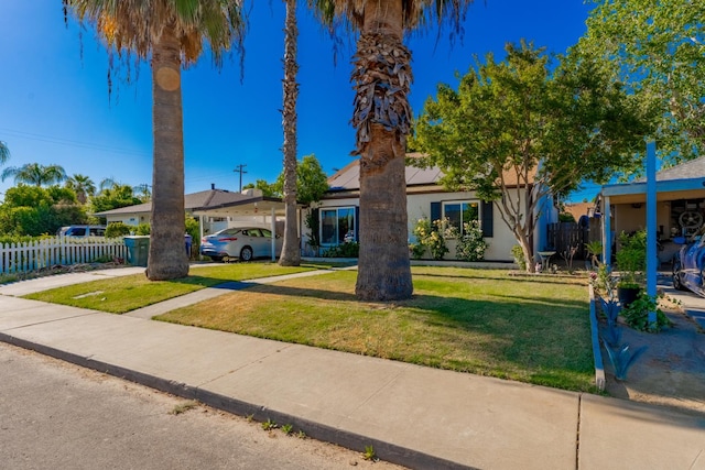 1428 E Simpson, Fresno, CA 93704 - view of front of house with roof mounted solar panels and stucco siding