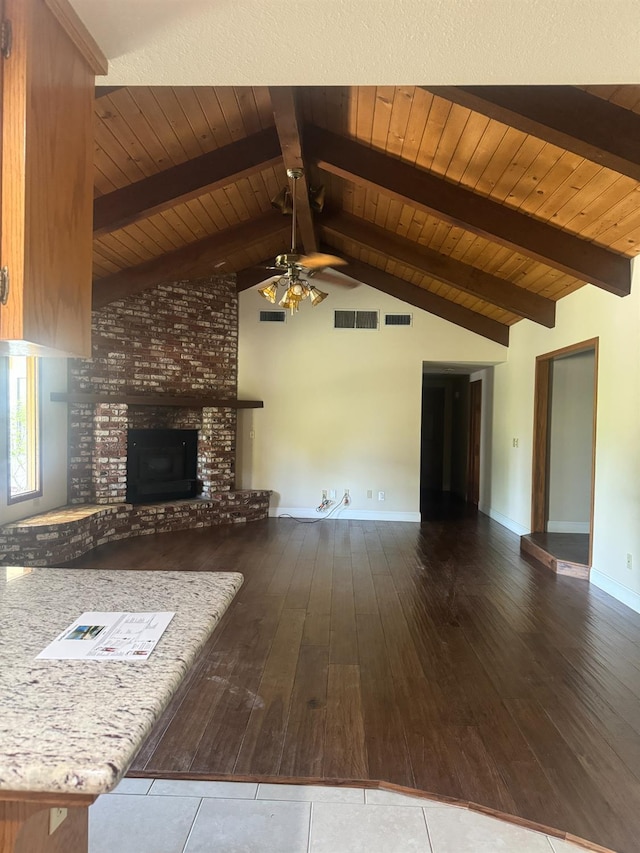 399 E Richmond Ave, Fresno, CA 93720 - unfurnished living room featuring a brick fireplace, ceiling fan, hardwood / wood-style flooring, and baseboards