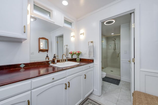 3519 N Van Ness Blvd, Fresno, CA 93704 - full bath with crown molding, a shower stall, vanity, toilet, and marble look tile flooring