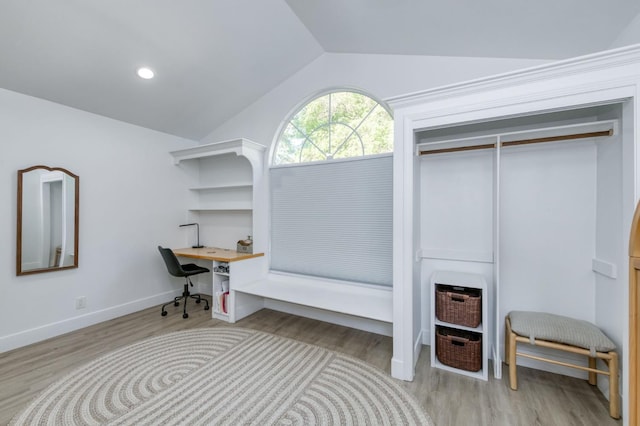 3519 N Van Ness Blvd, Fresno, CA 93704 - home office with vaulted ceiling, wood finished floors, baseboards, and built in desk