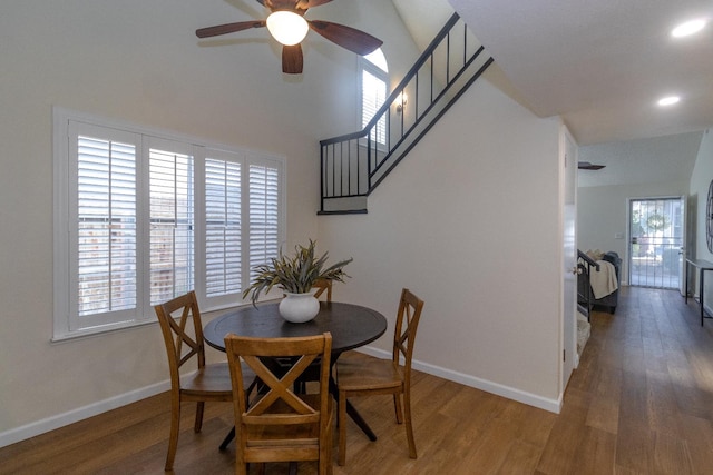 dining space with ceiling fan, wood finished floors, baseboards, and recessed lighting