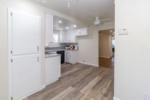 5455 N Marty Ave Unit 132, Fresno, CA 93711 - kitchen featuring ceiling fan, dishwasher, white cabinets, light wood-style floors, and backsplash
