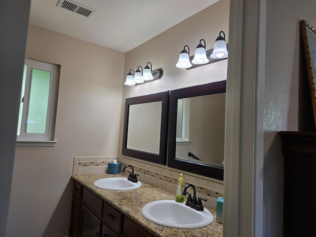 1489 Celeste Ave, Clovis, CA 93611 - full bathroom featuring tasteful backsplash and double vanity