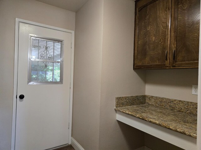 1489 Celeste Ave, Clovis, CA 93611 - doorway to outside featuring baseboards