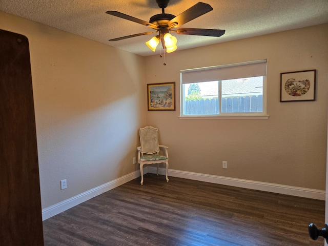 1489 Celeste Ave, Clovis, CA 93611 - unfurnished room featuring a textured ceiling, wood finished floors, a ceiling fan, and baseboards