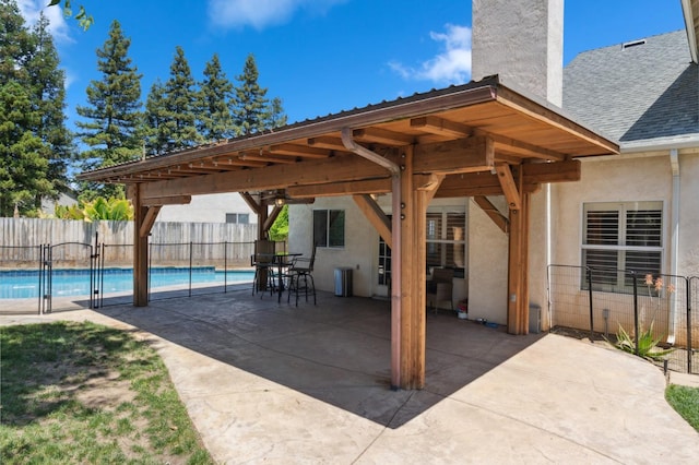 view of patio / terrace with fence