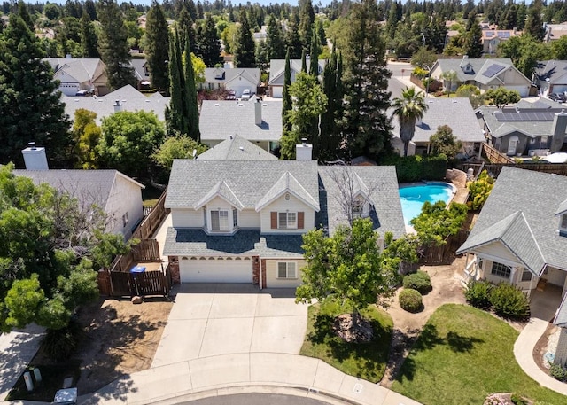 aerial perspective of suburban area with a pool area