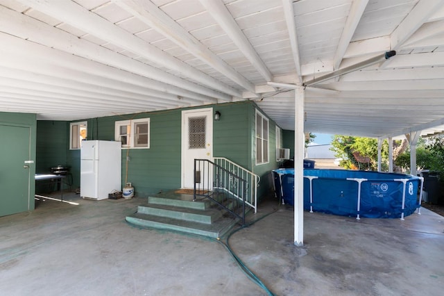 2140 E Floradora Ave, Fresno, CA 93703 - view of patio with a carport