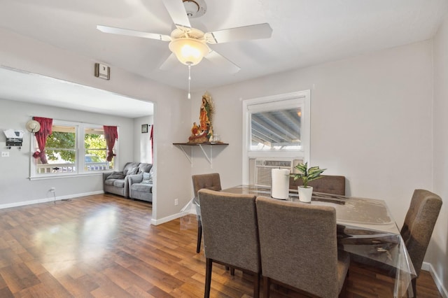 2140 E Floradora Ave, Fresno, CA 93703 - dining space with wood finished floors, ceiling fan, cooling unit, and baseboards