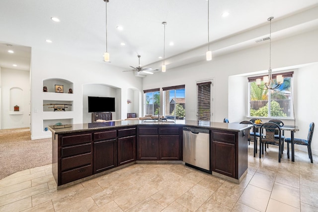 5279 N Ensanada Ave, Fresno, CA 93723 - kitchen with stainless steel dishwasher, recessed lighting, dark brown cabinetry, open floor plan, and a chandelier