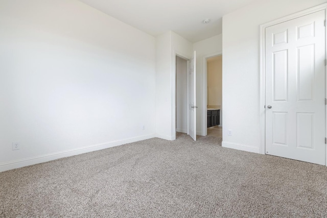 5279 N Ensanada Ave, Fresno, CA 93723 - unfurnished bedroom with light colored carpet and baseboards