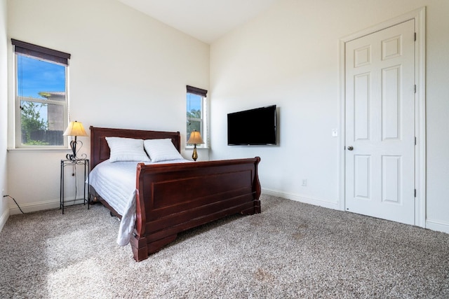 5279 N Ensanada Ave, Fresno, CA 93723 - carpeted bedroom featuring baseboards and multiple windows