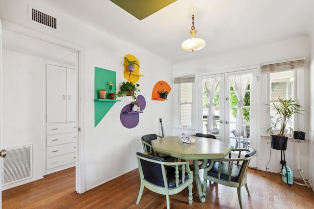 2020 N Fruit Ave, Fresno, CA 93705 - dining area with french doors, wood finished floors, and baseboards