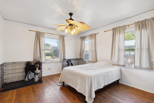 2020 N Fruit Ave, Fresno, CA 93705 - bedroom featuring hardwood / wood-style flooring, baseboards, and a ceiling fan