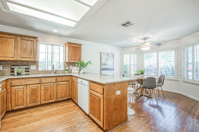 198 Decatur Ave, Clovis, CA 93611 - kitchen featuring white dishwasher, a sink, plenty of natural light, and recessed lighting