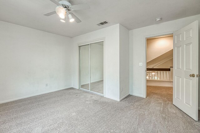 198 Decatur Ave, Clovis, CA 93611 - unfurnished bedroom with light colored carpet, baseboards, a closet, and ceiling fan