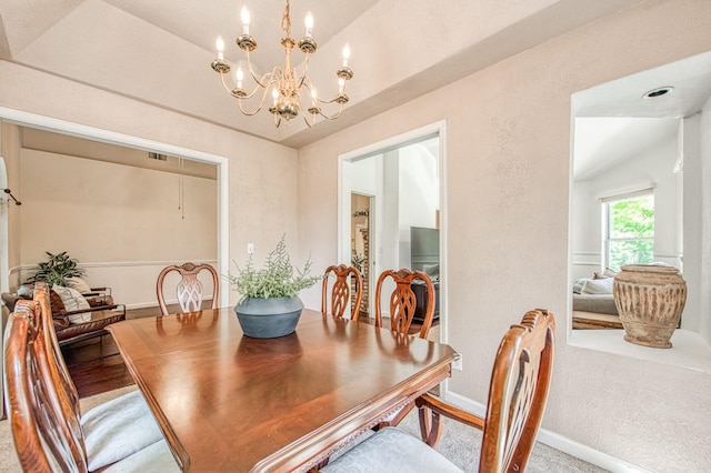 198 Decatur Ave, Clovis, CA 93611 - carpeted dining area featuring a chandelier and baseboards