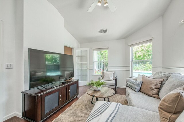 198 Decatur Ave, Clovis, CA 93611 - living room featuring lofted ceiling, dark wood-style floors, ceiling fan, and baseboards